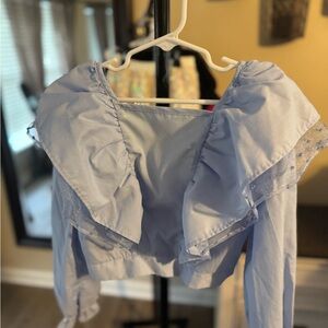 Light Blue Ruffled Blouse photo topper
